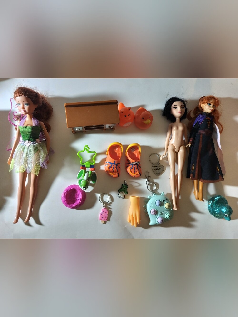 Disney Doll & Accessory Mix with Green, Orange, Pink and Blue Accents